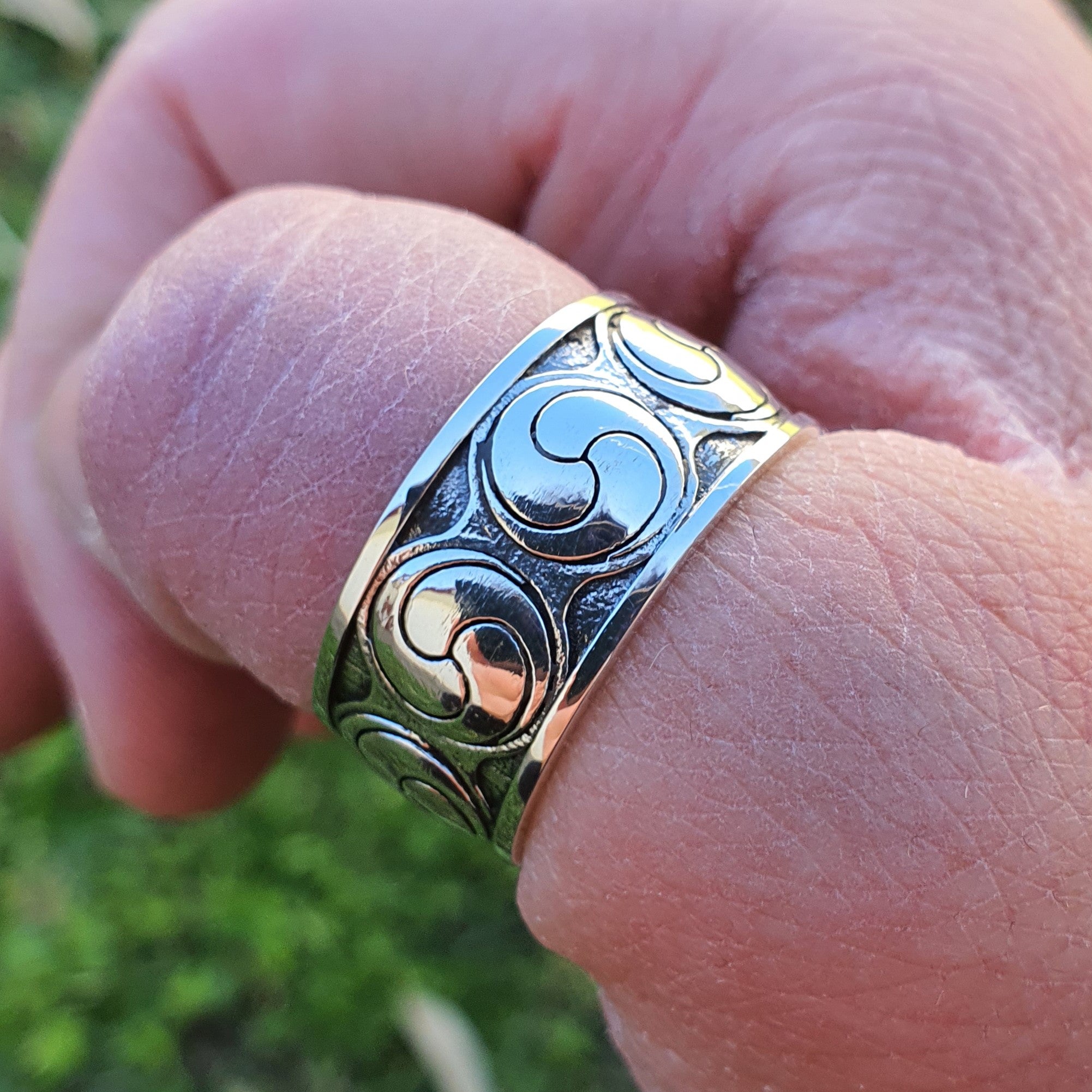 Sterling silver manufactured using wax casting, polished for a slightly textured, mild sheen surface, and recessed details blackened for a steampunk look.
