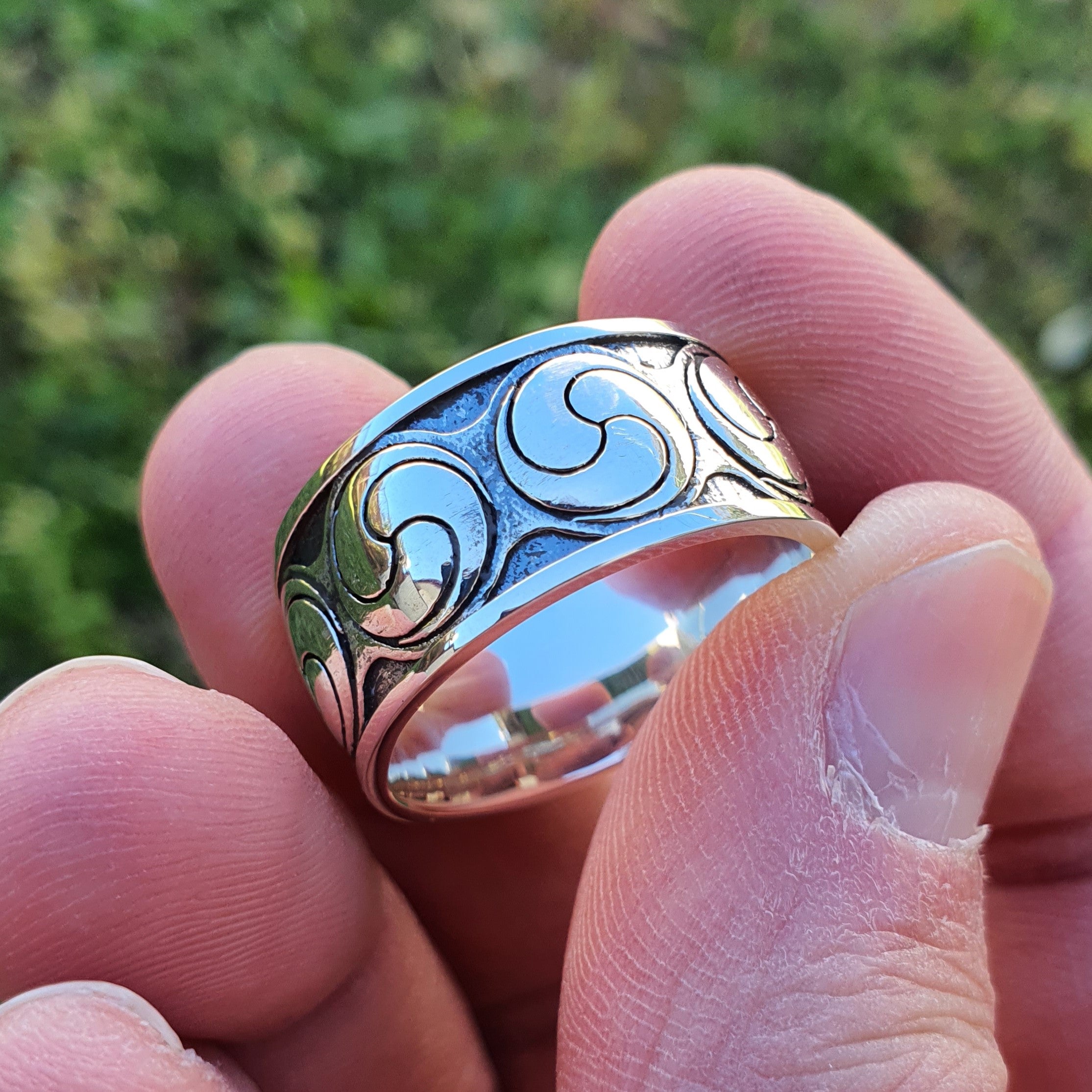 Sterling silver manufactured using wax casting, polished for a slightly textured, mild sheen surface, and recessed details blackened for a steampunk look.