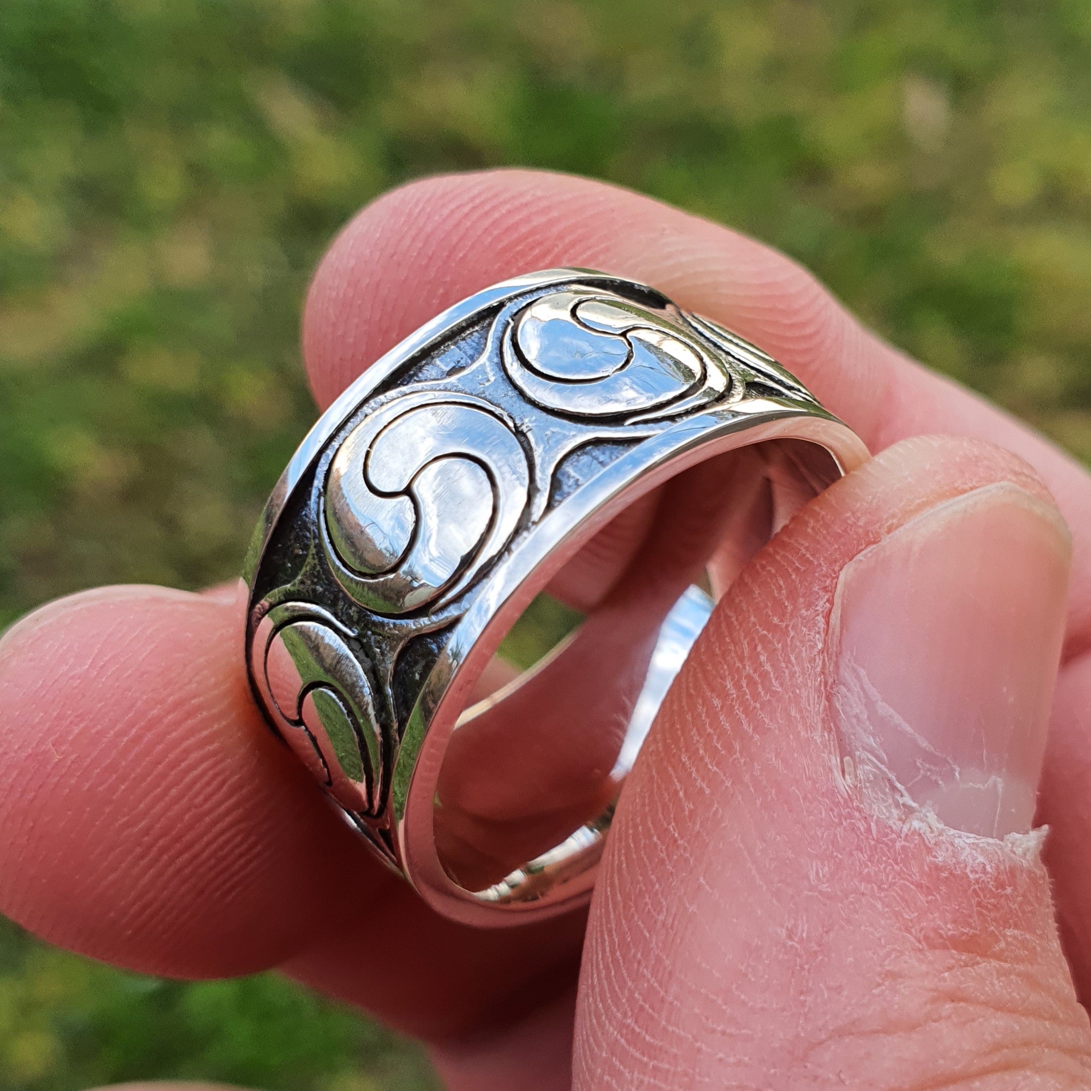 Sterling silver manufactured using wax casting, polished for a slightly textured, mild sheen surface, and recessed details blackened for a steampunk look.
